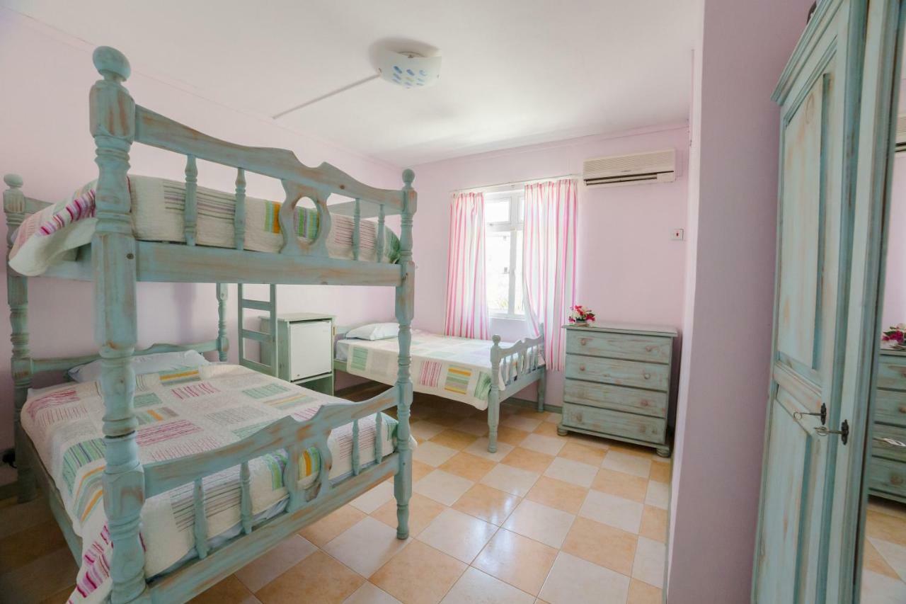 Villa Bella Charming Beachfront Guesthouse Blue Bay Exterior photo