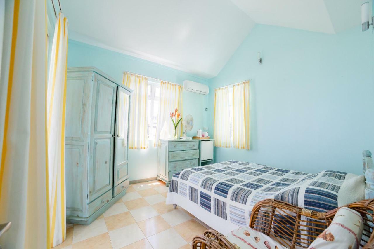 Villa Bella Charming Beachfront Guesthouse Blue Bay Exterior photo